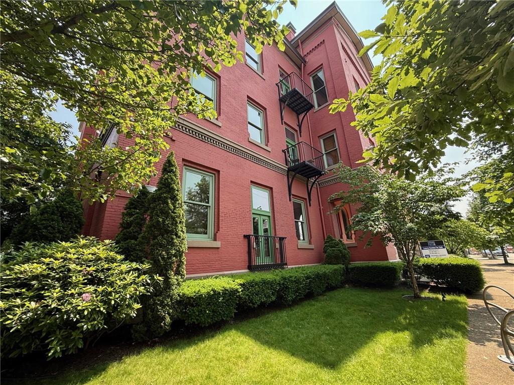 3080 Smallman Street Pittsburgh, PA 15201 - Photo 48 of 48 front view of a house with a yard