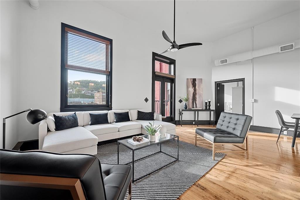 3080 Smallman Street Pittsburgh, PA 15201 - Photo 9 of 48 a living room with furniture and a window