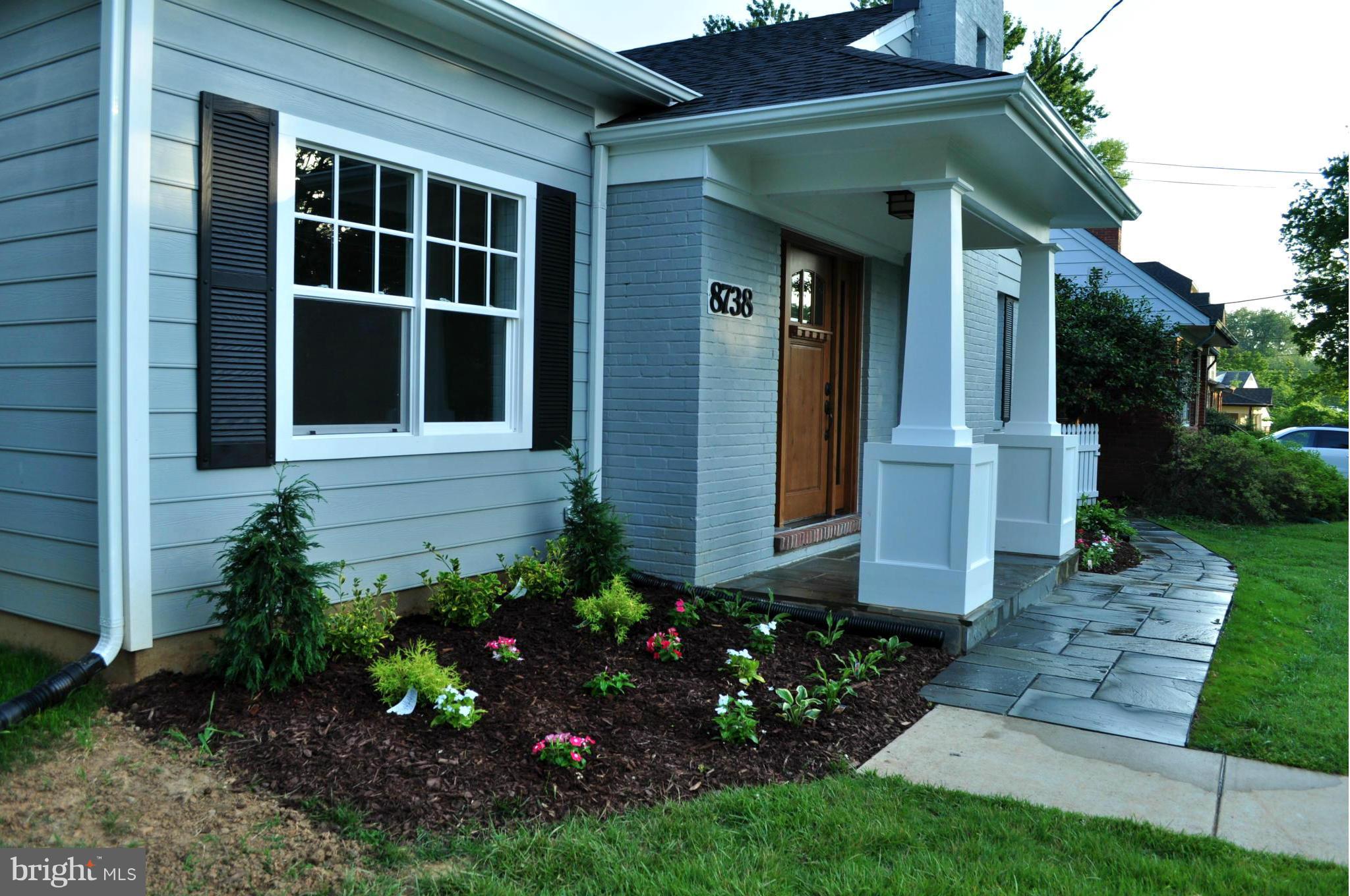 8738 Ridge Road Bethesda, MD 20817 - Photo 1 of 30 a front view of a house with garden