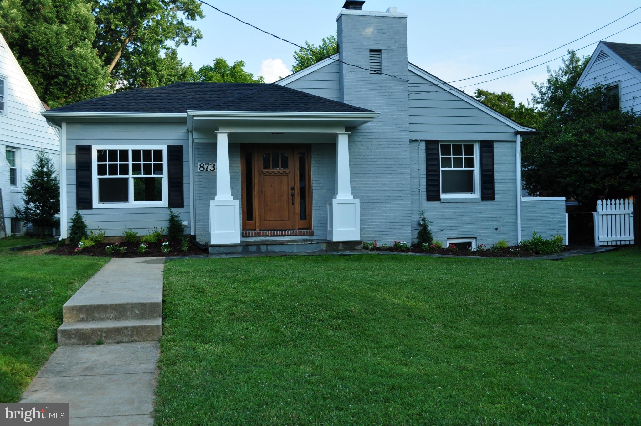 8738 Ridge Road Bethesda, MD 20817 - Photo 2 of 30 front view of a house with a yard