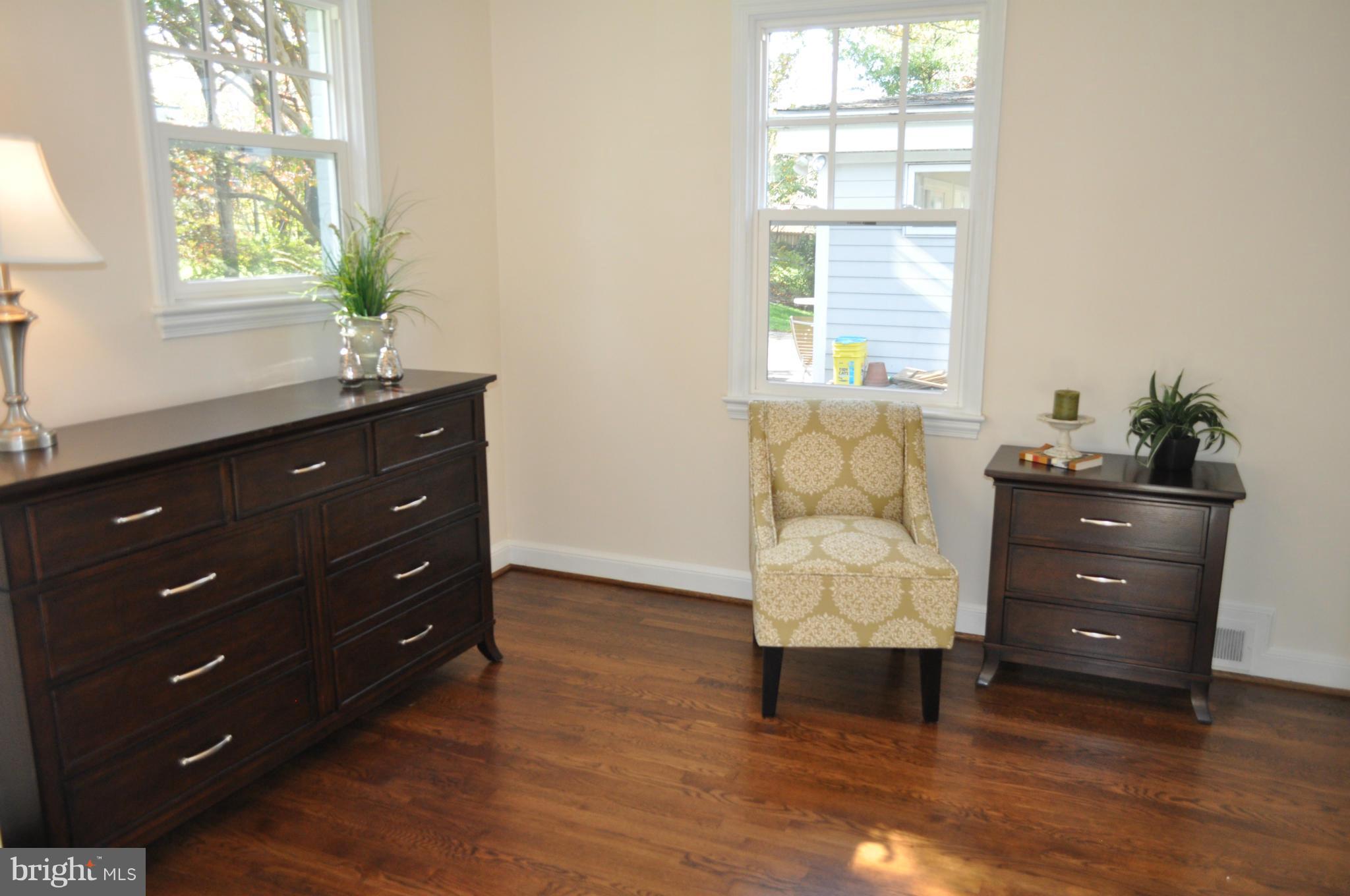 8738 Ridge Road Bethesda, MD 20817 - Photo 13 of 30 a room with a window and a dresser