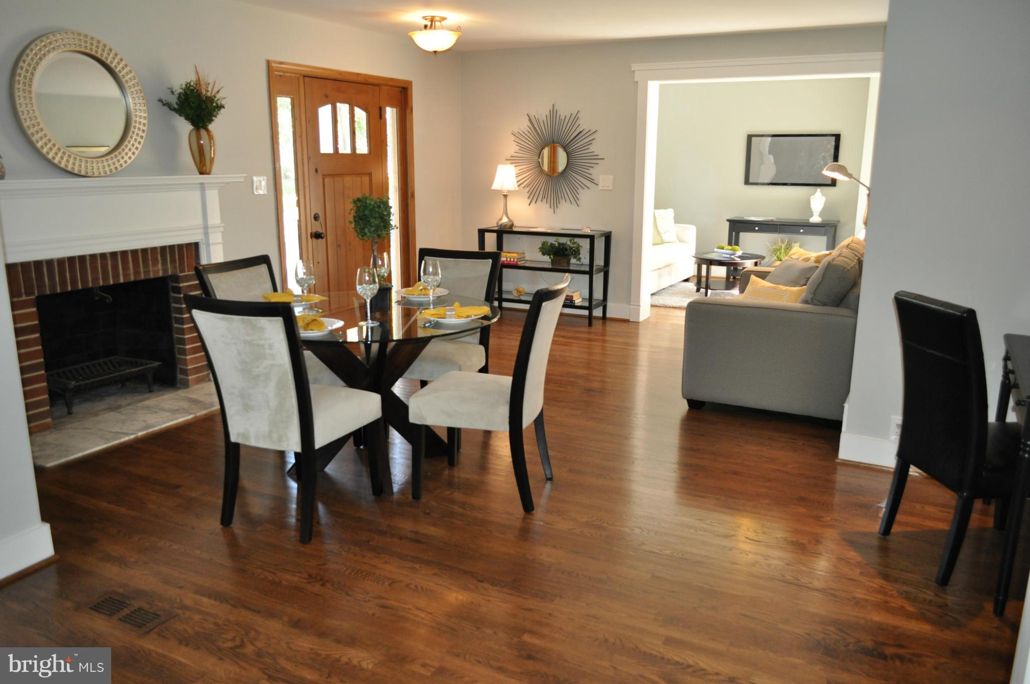 8738 Ridge Road Bethesda, MD 20817 - Photo 3 of 30 a view of a dining room with furniture and wooden floor