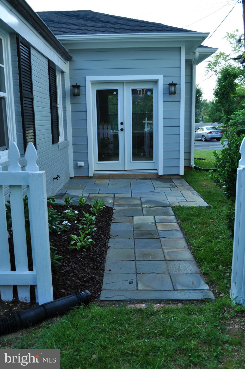 8738 Ridge Road Bethesda, MD 20817 - Photo 25 of 30 front view of a house with a yard