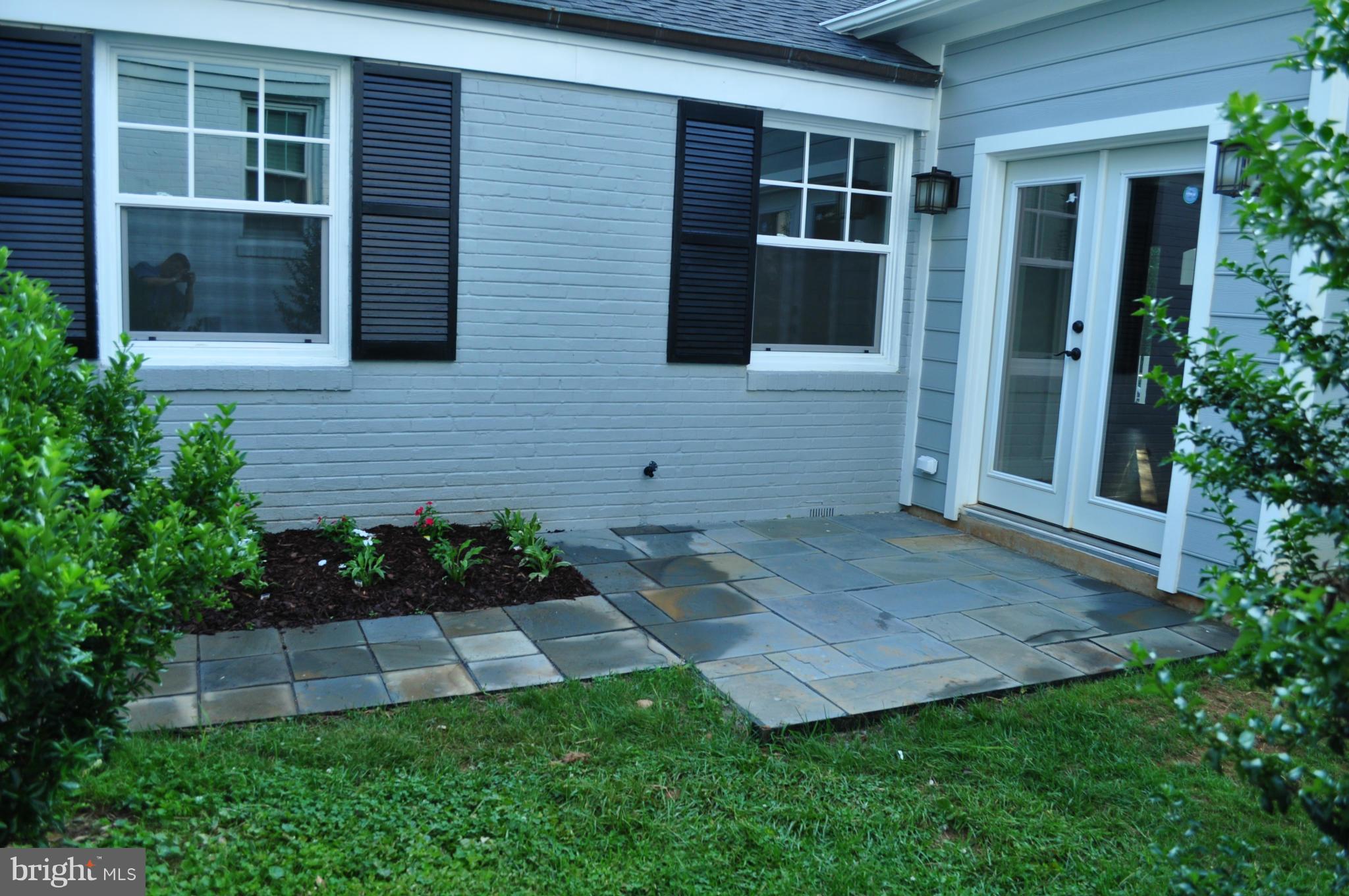 8738 Ridge Road Bethesda, MD 20817 - Photo 26 of 30 front view of a house with a yard
