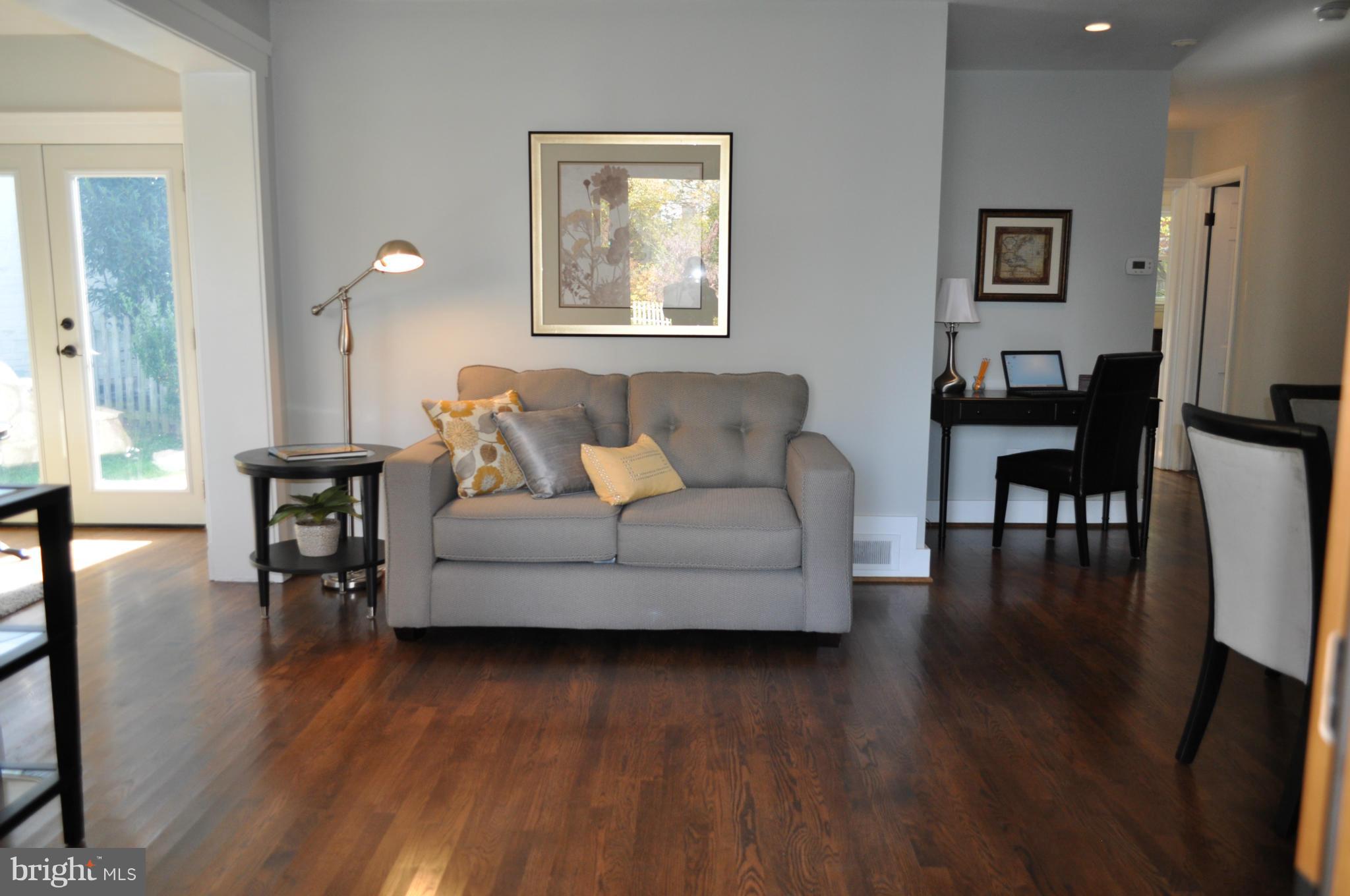 8738 Ridge Road Bethesda, MD 20817 - Photo 5 of 30 a living room with furniture and a wooden floor