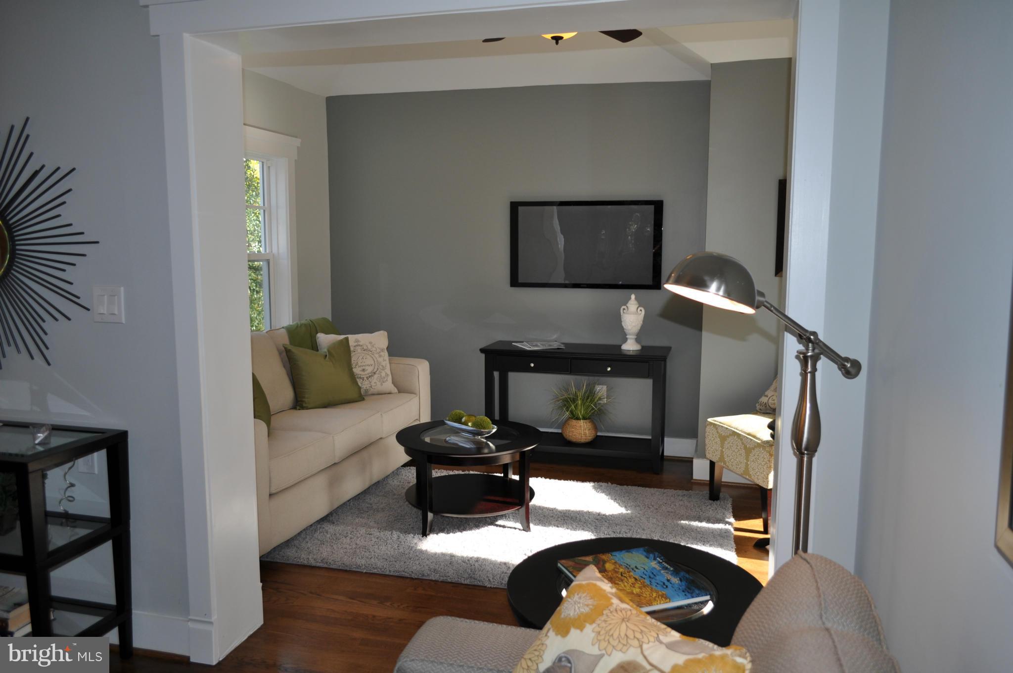 8738 Ridge Road Bethesda, MD 20817 - Photo 7 of 30 a living room with furniture and a wooden floor