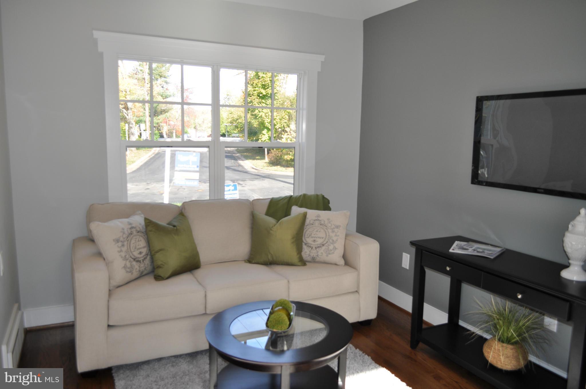 8738 Ridge Road Bethesda, MD 20817 - Photo 8 of 30 a living room with furniture and a window