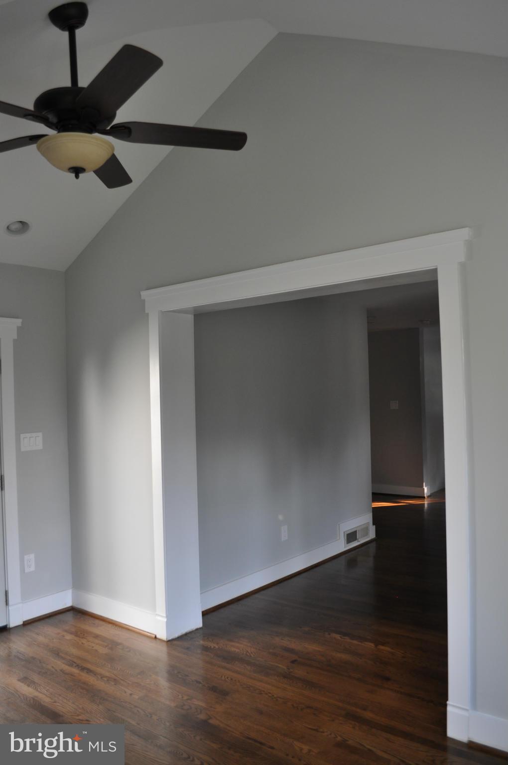 8738 Ridge Road Bethesda, MD 20817 - Photo 10 of 30 an empty room with wooden floor