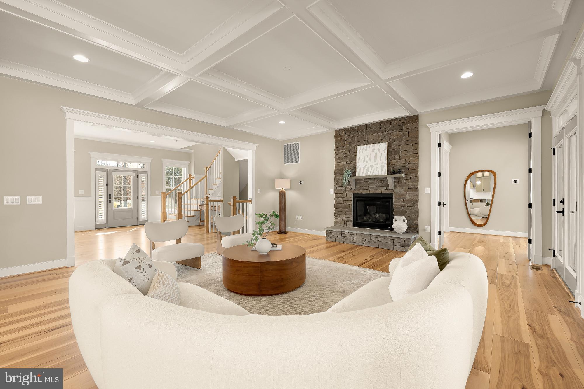 12650 Popes Head Road Clifton, VA 20124 - Photo 11 of 69 a living room with fireplace furniture and a wooden floor