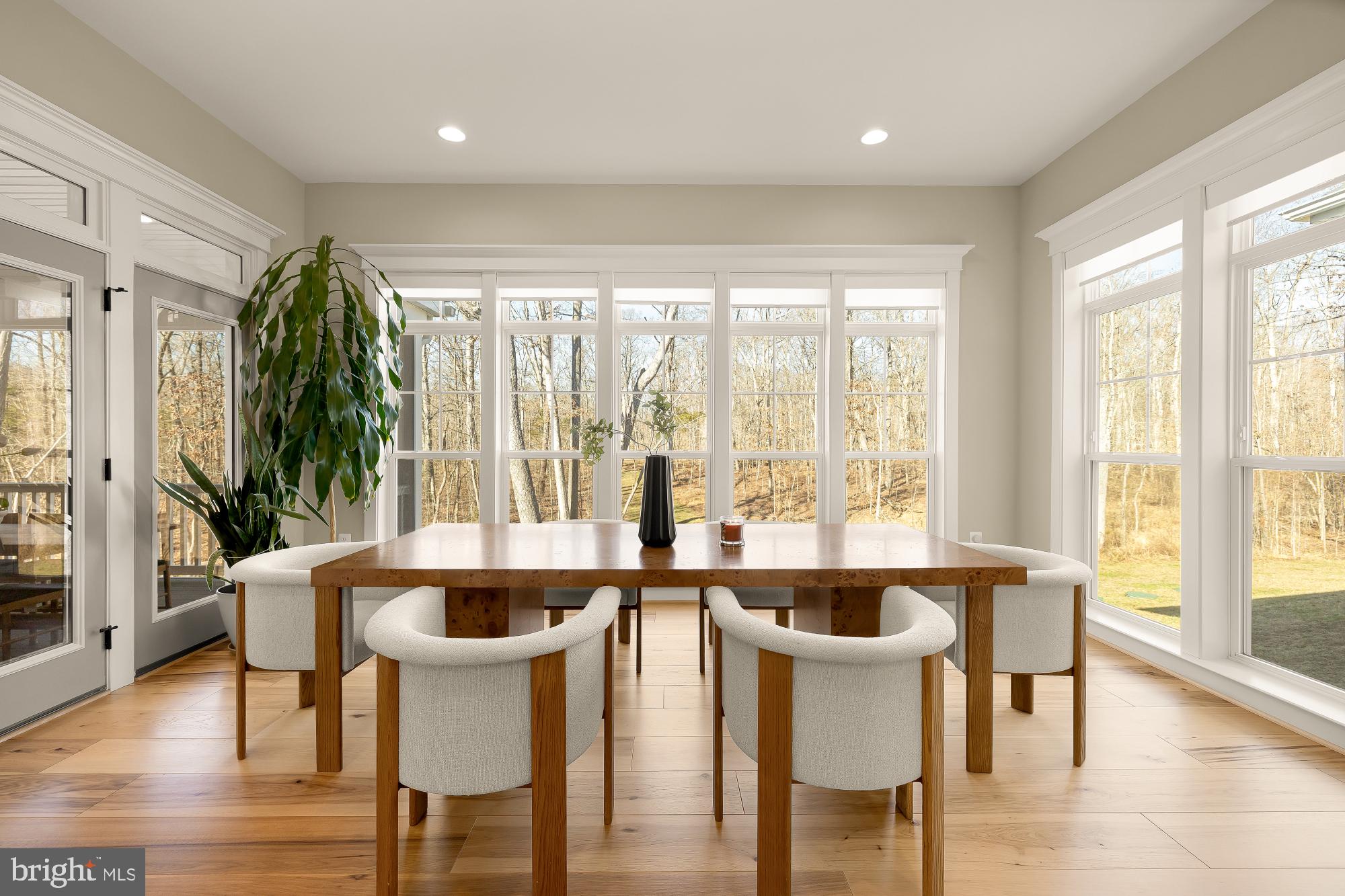 12650 Popes Head Road Clifton, VA 20124 - Photo 20 of 69 a view of a dining room with furniture and wooden floor