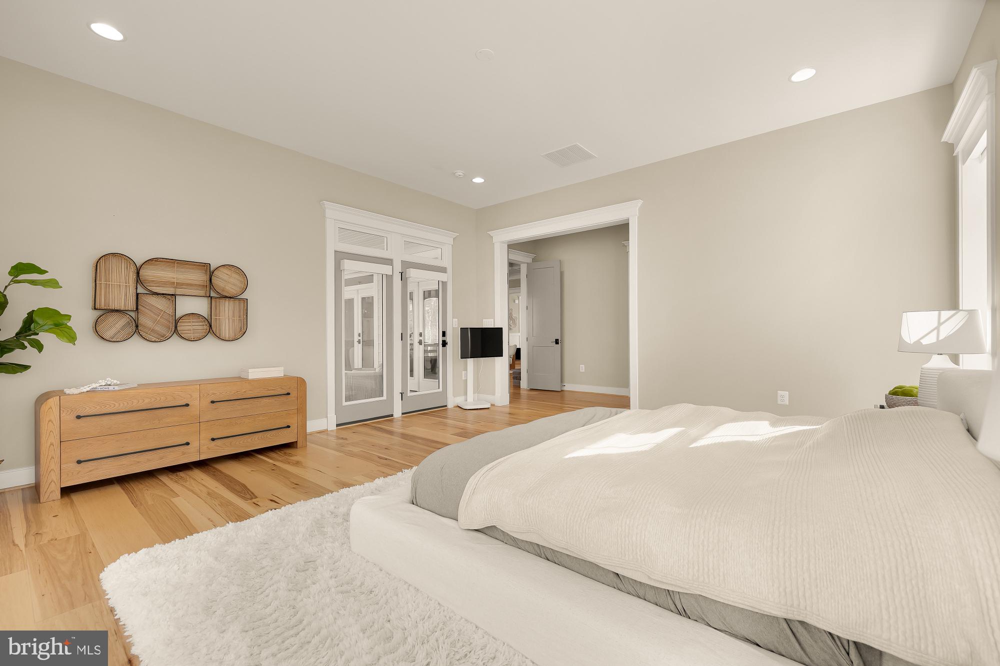 12650 Popes Head Road Clifton, VA 20124 - Photo 29 of 69 a bedroom with a bed and a couch