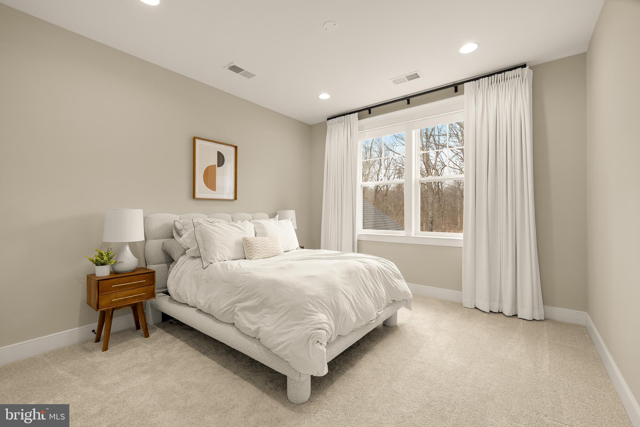 12650 Popes Head Road Clifton, VA 20124 - Photo 35 of 69 a bedroom with a bed and a window