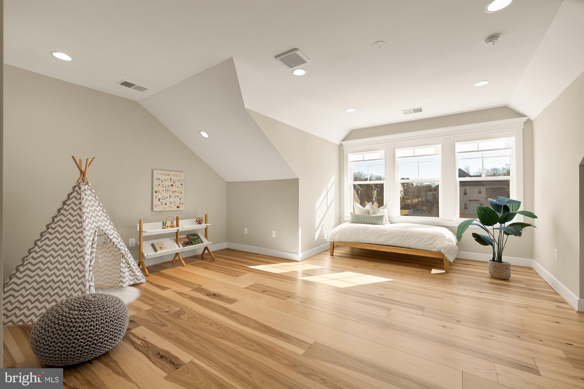 12650 Popes Head Road Clifton, VA 20124 - Photo 39 of 69 a bedroom with furniture and a large window