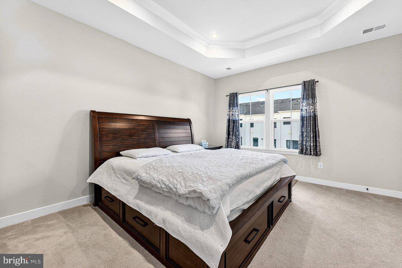 39 Sage Way Mount Laurel, NJ 08054 - Photo 16 of 32 a spacious bedroom with a bed and window