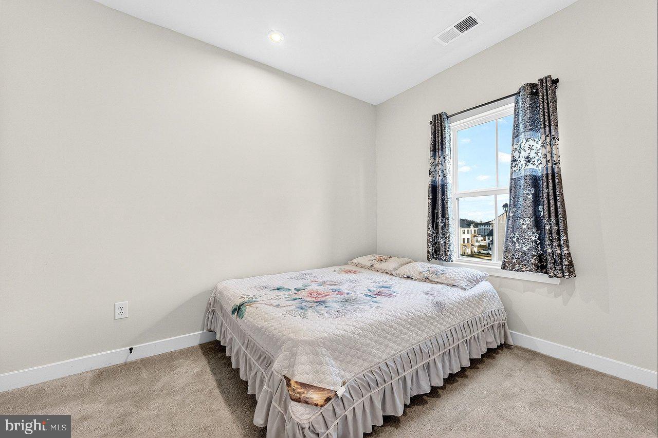 39 Sage Way Mount Laurel, NJ 08054 - Photo 20 of 32 a bedroom with a bed and a window