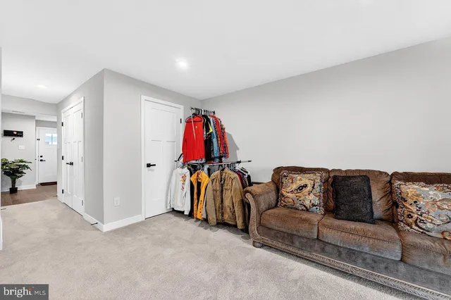 a living room with furniture and a couch