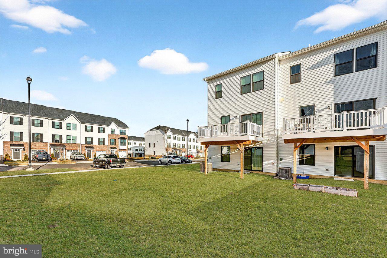 39 Sage Way Mount Laurel, NJ 08054 - Photo 27 of 32 a view of a building with a swimming pool