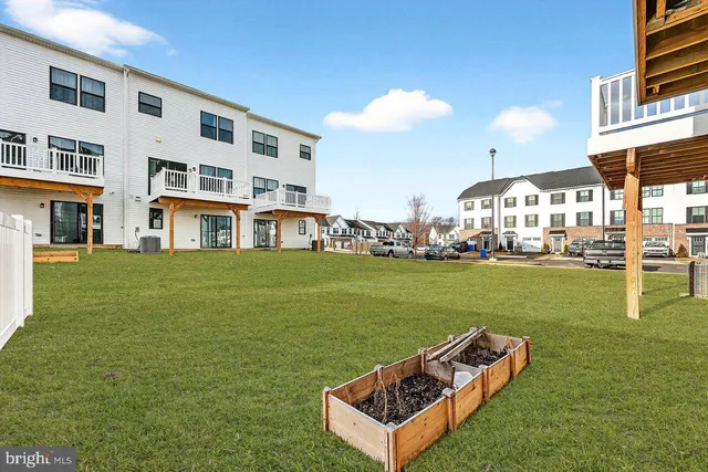 a view of a house with a big yard