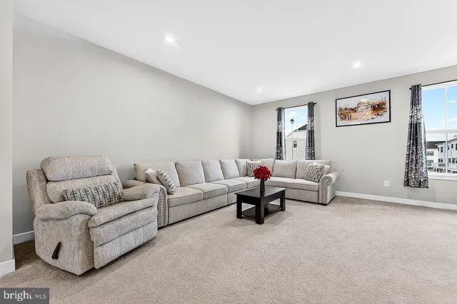a living room with furniture and a couch