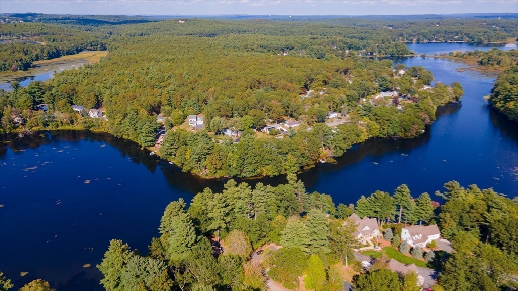 7 Groveland Street Ayer, MA 01432 - Photo 13 of 35 a view of a lake with a mountain in the background
