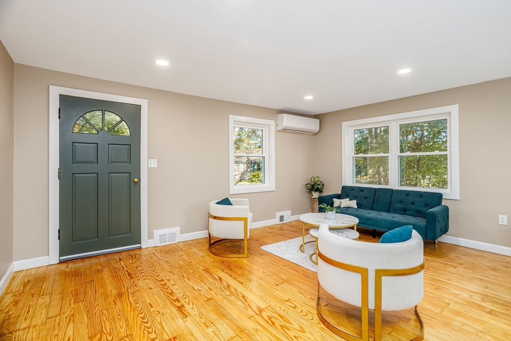 7 Groveland Street Ayer, MA 01432 - Photo 15 of 35 a living room with furniture and a window