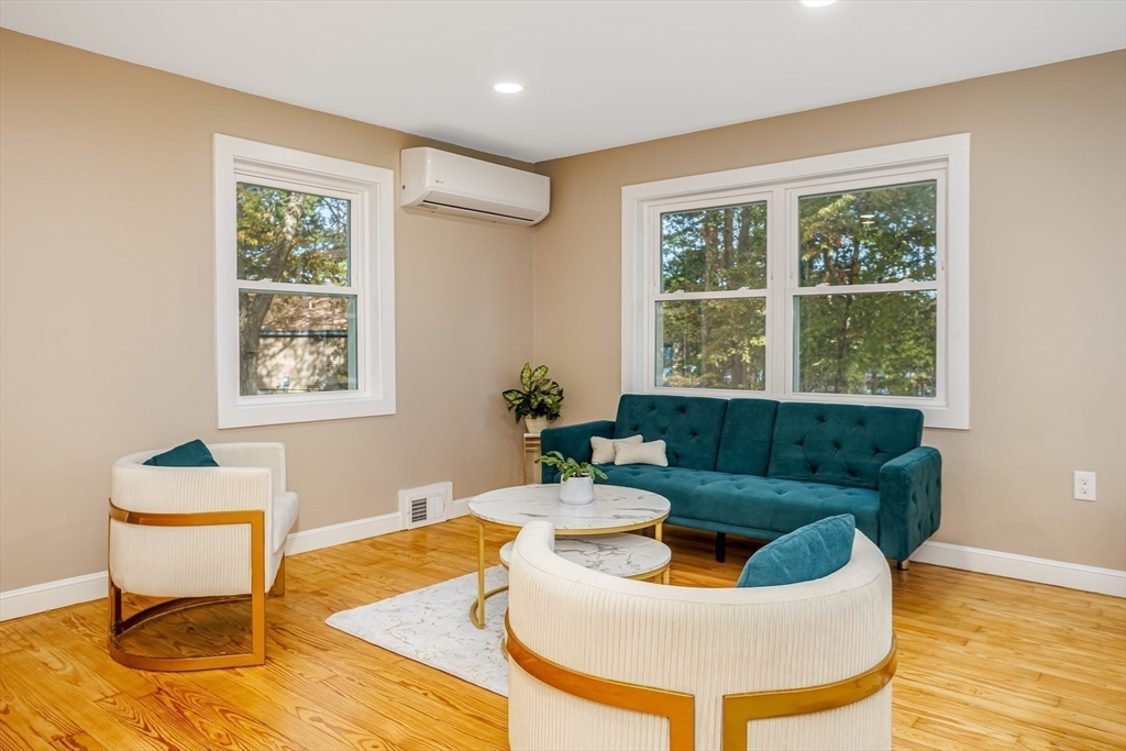 7 Groveland Street Ayer, MA 01432 - Photo 16 of 35 a living room with furniture and a window