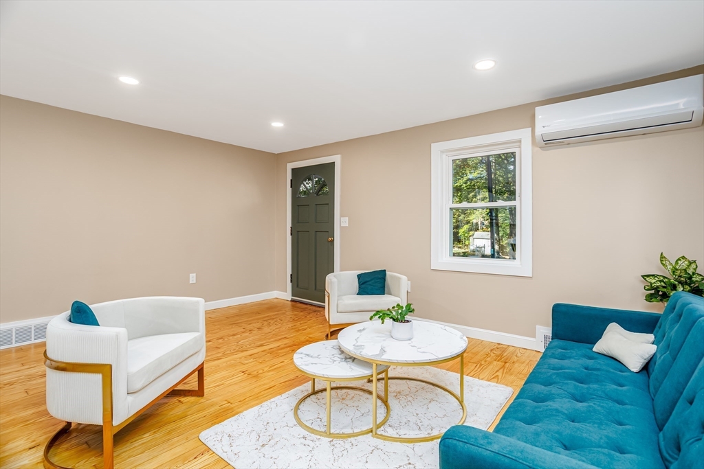 7 Groveland Street Ayer, MA 01432 - Photo 20 of 35 a living room with furniture and a window