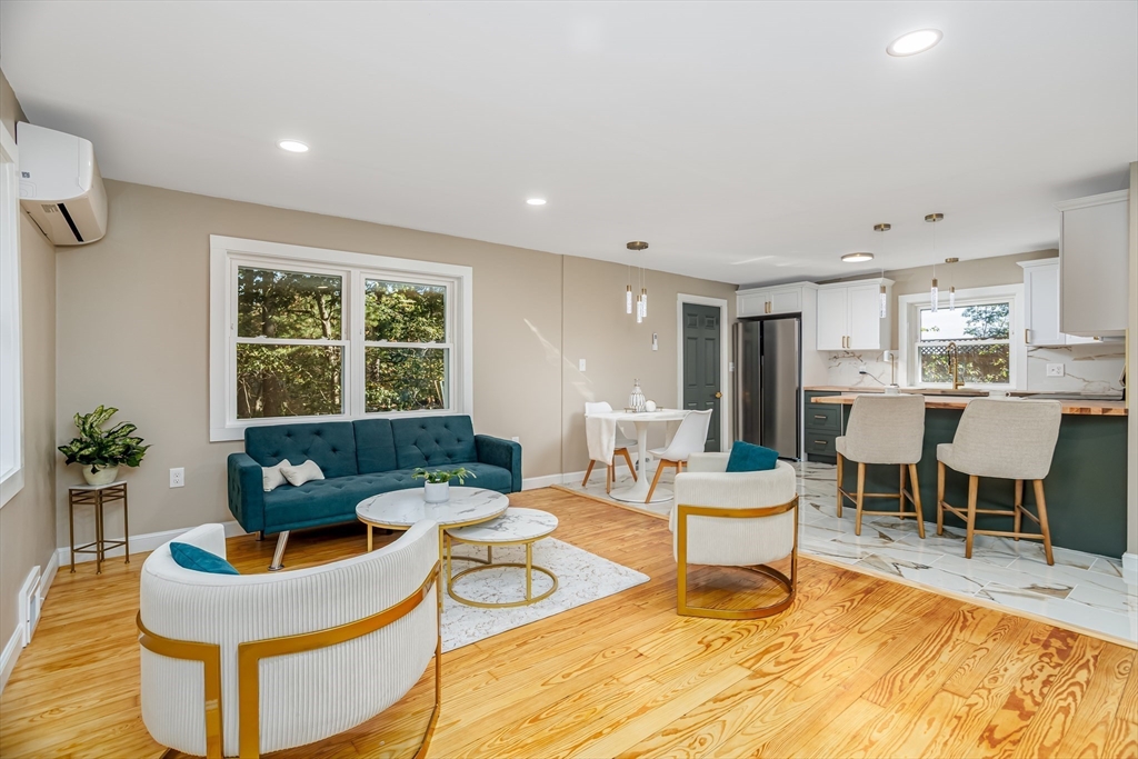 7 Groveland Street Ayer, MA 01432 - Photo 21 of 35 a living room with furniture and a window