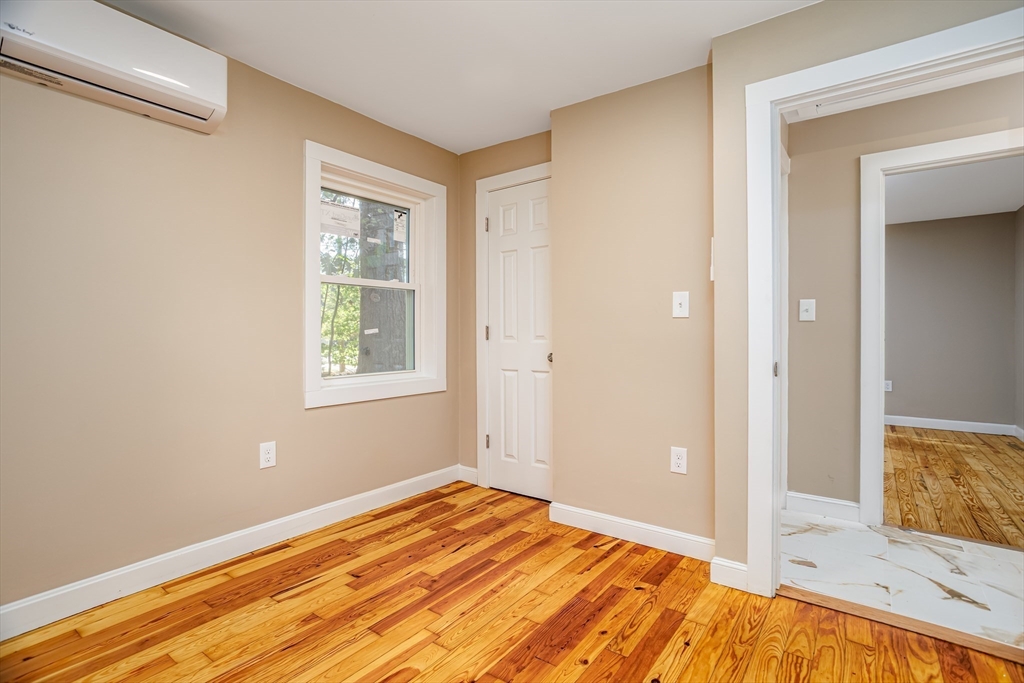 7 Groveland Street Ayer, MA 01432 - Photo 30 of 35 a view of a room with wooden floor and bedroom