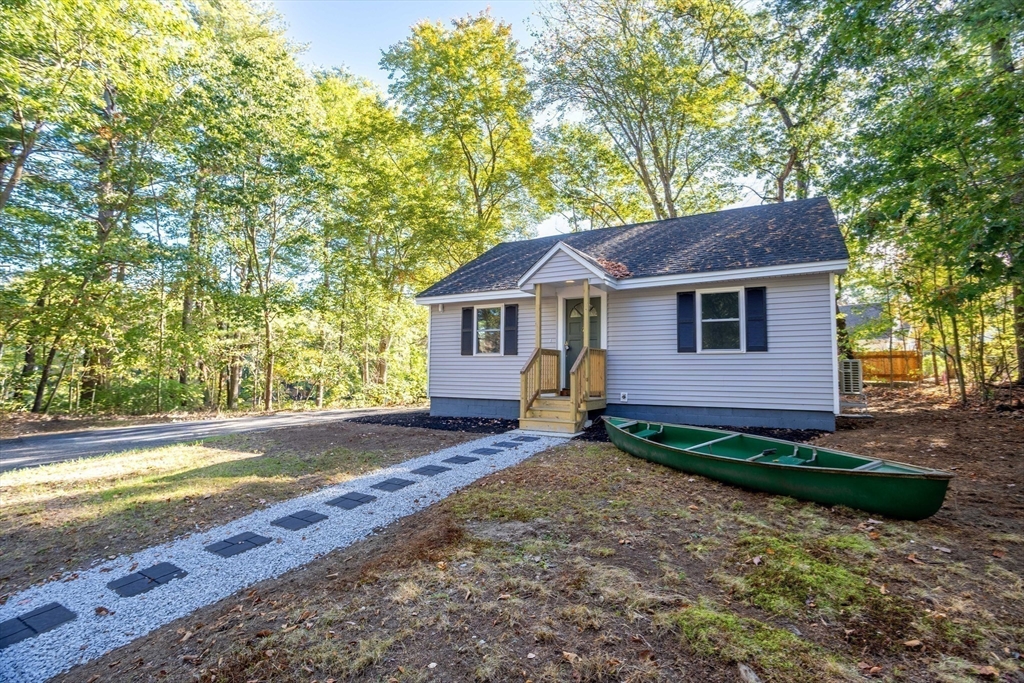 7 Groveland Street Ayer, MA 01432 - Photo 9 of 35 a view of a house with a yard