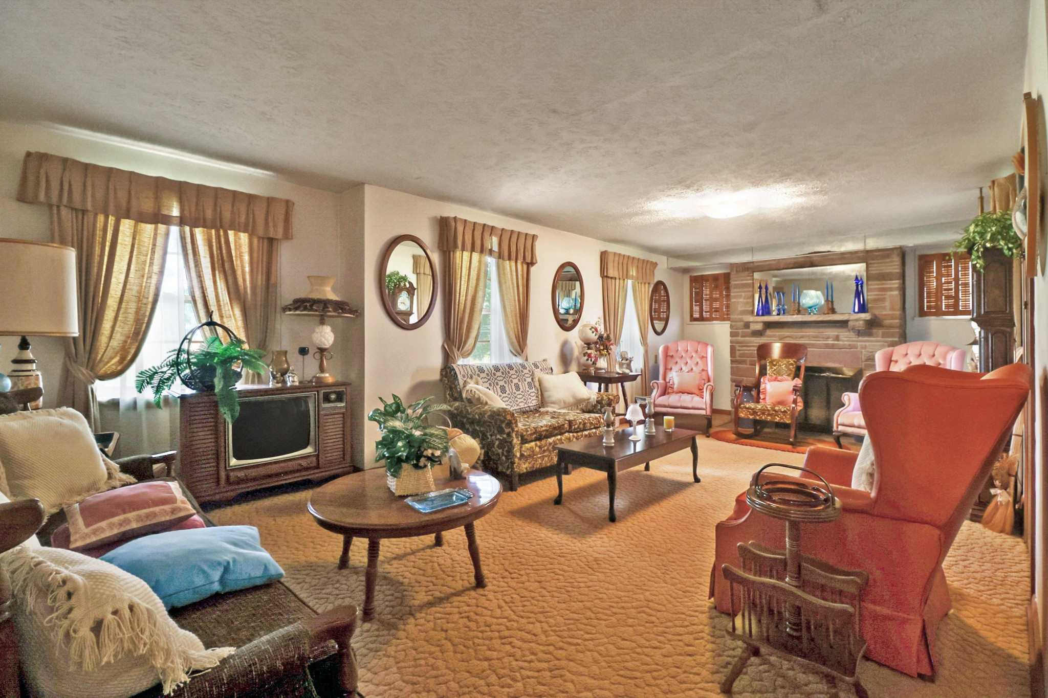 1386 Pigeon Ridge Road Crossville, TN 38572 - Photo 24 of 41 a living room with furniture a fireplace and a large window