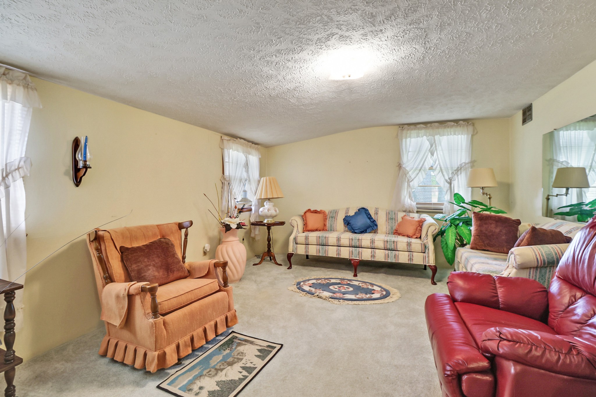 1386 Pigeon Ridge Road Crossville, TN 38572 - Photo 33 of 41 a living room with furniture a rug and a window