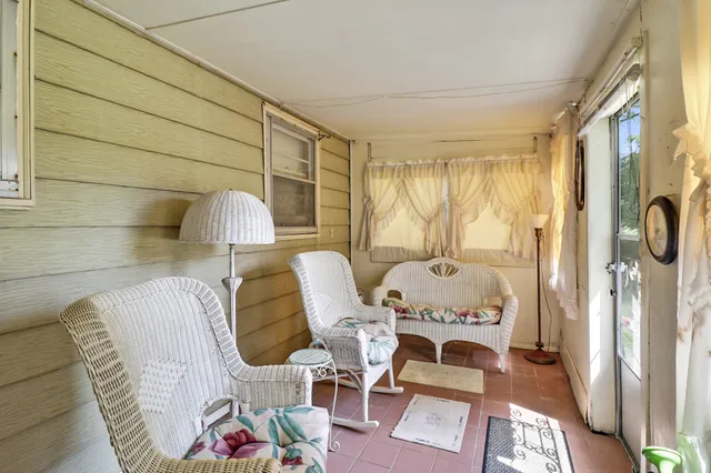 a living room with a couch and a table
