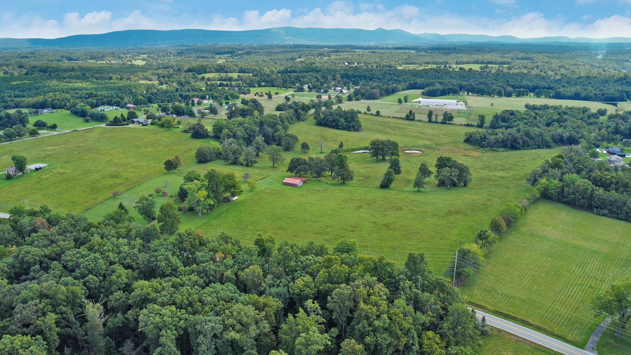 1386 Pigeon Ridge Road Crossville, TN 38572 - Photo 39 of 41 a view of a city with lush green forest