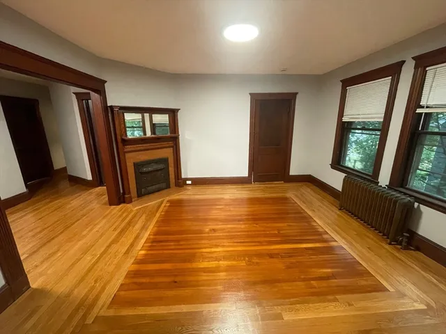 a view of livingroom with hardwood and furniture