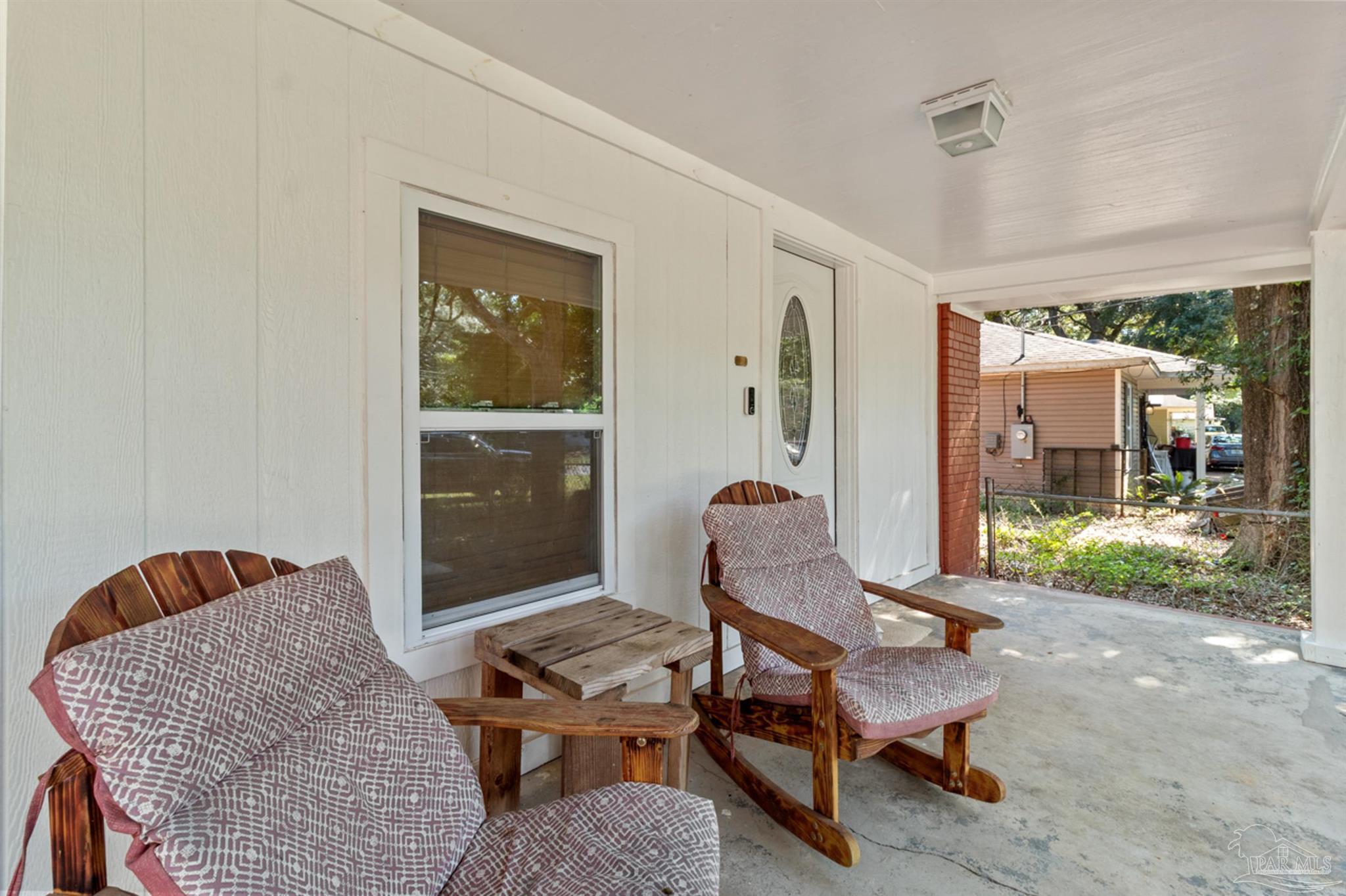 6608 Magnolia Street Milton, FL 32570 - Photo 36 of 36 a living room with furniture and a window