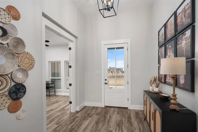 a view of livingroom with furniture and wooden floor