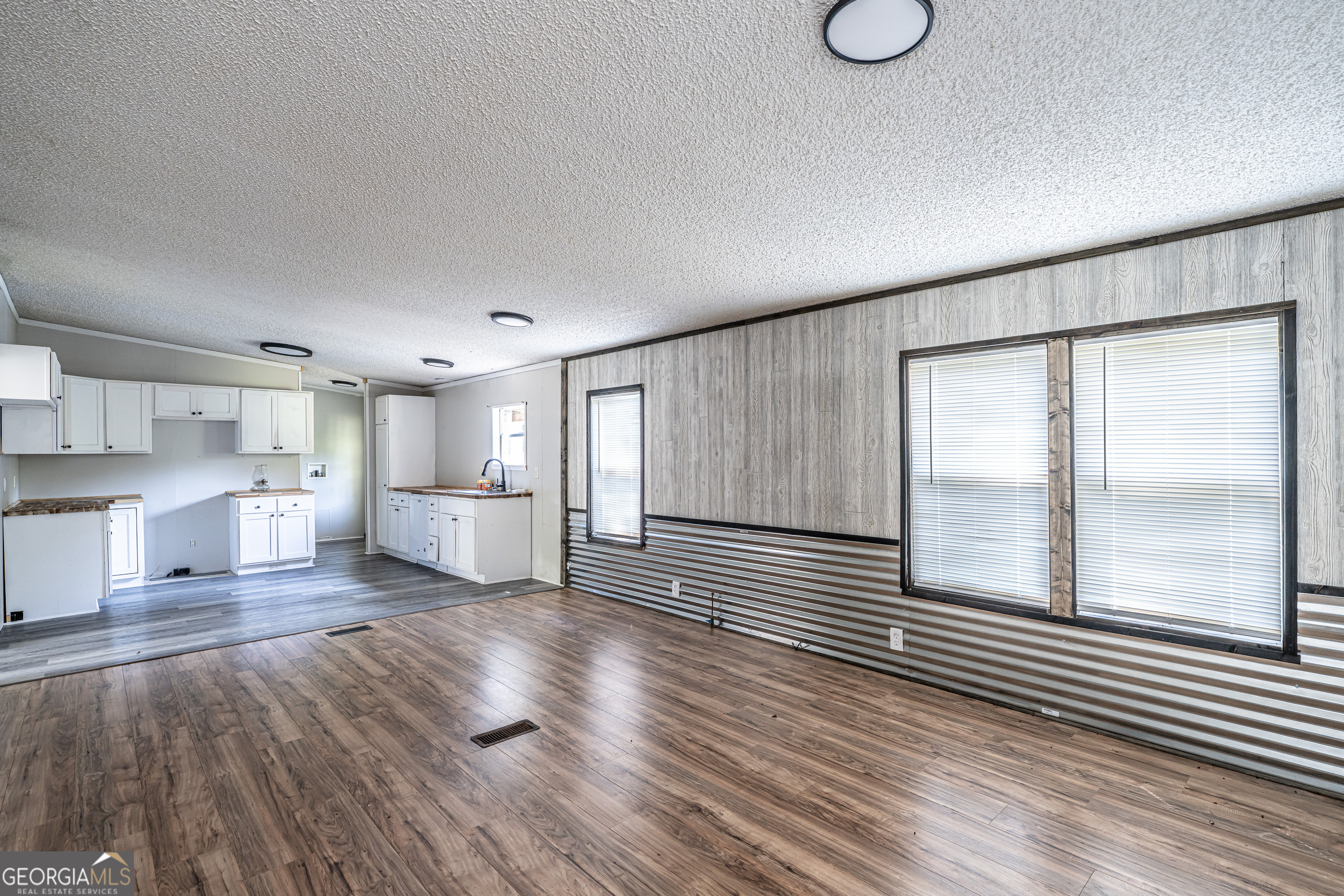 71 Kirk Road Northwest White, GA 30184 - Photo 7 of 43 a view of a room with wooden floor and window