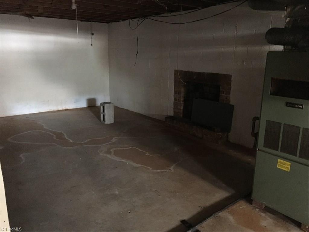 162 Rhodes Road Eden, NC 27288 - Photo 15 of 15 Fireplace in Basement