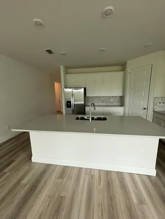 a living room with a couch and a table