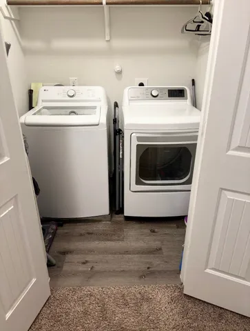 a view of a house with a yard and plants