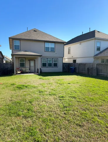 a house view with a outdoor space