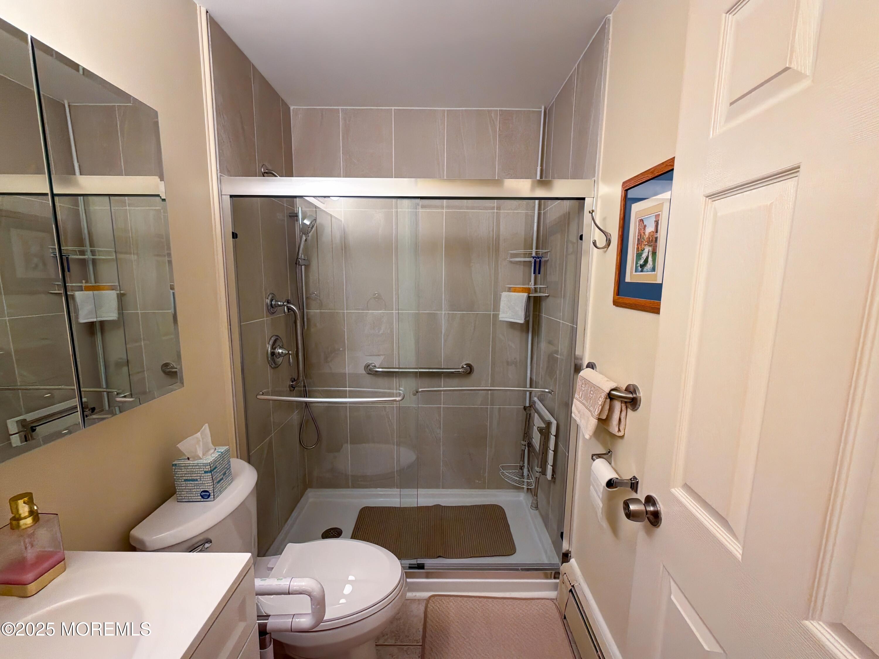 2 Corey Lane, Unit C Jackson, NJ 08527 - Photo 16 of 32 a bathroom with a toilet and a shower