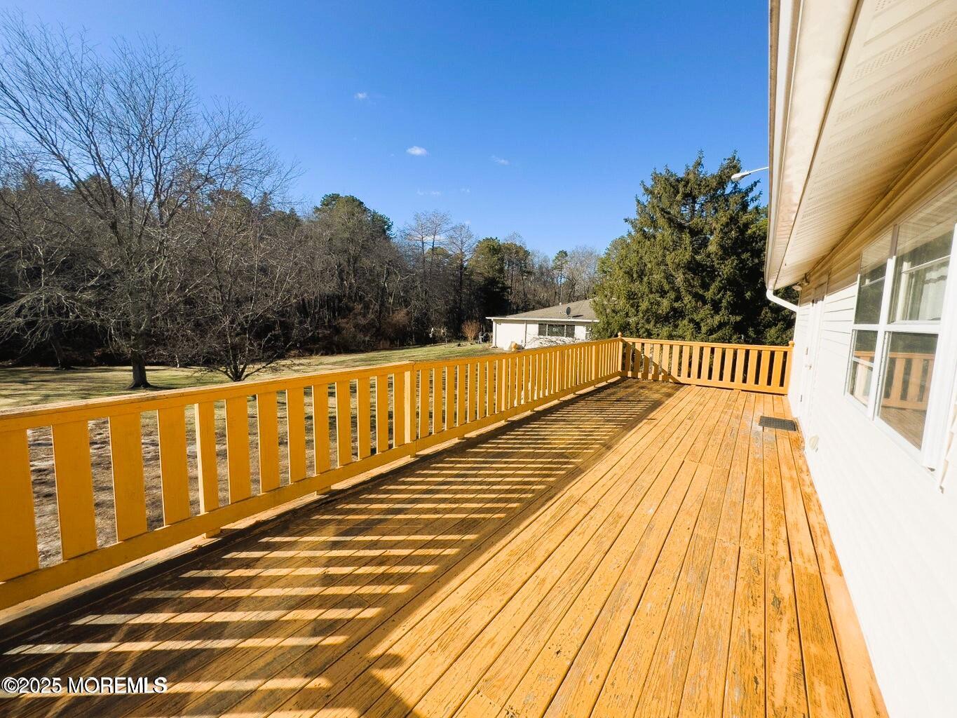 2 Corey Lane, Unit C Jackson, NJ 08527 - Photo 29 of 32 a view of wooden balcony with outdoor space