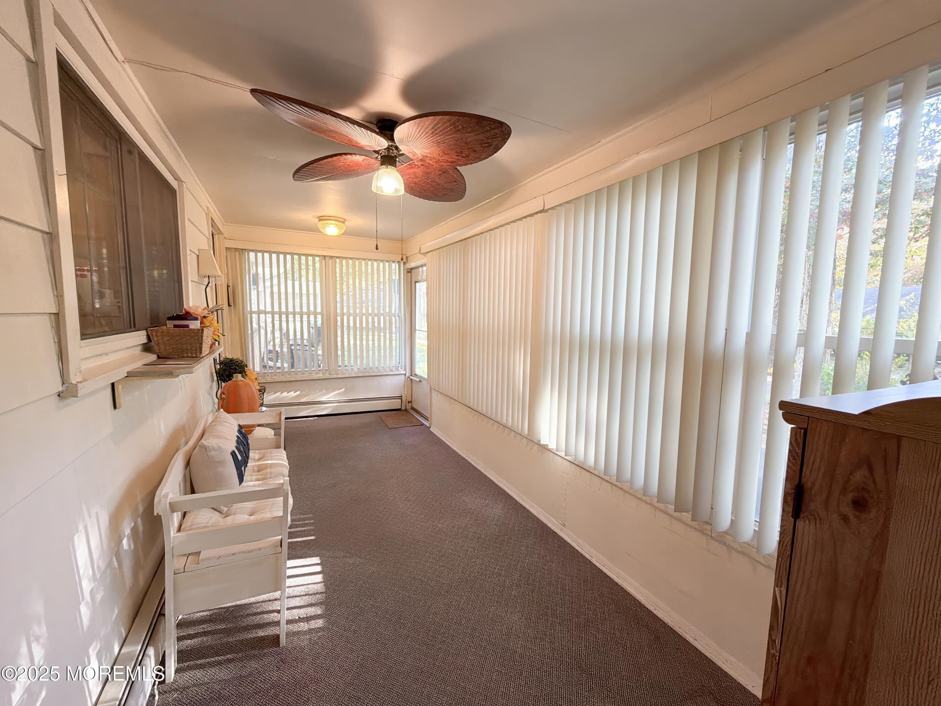 2 Corey Lane, Unit C Jackson, NJ 08527 - Photo 5 of 32 a room with gym equipment and a large window