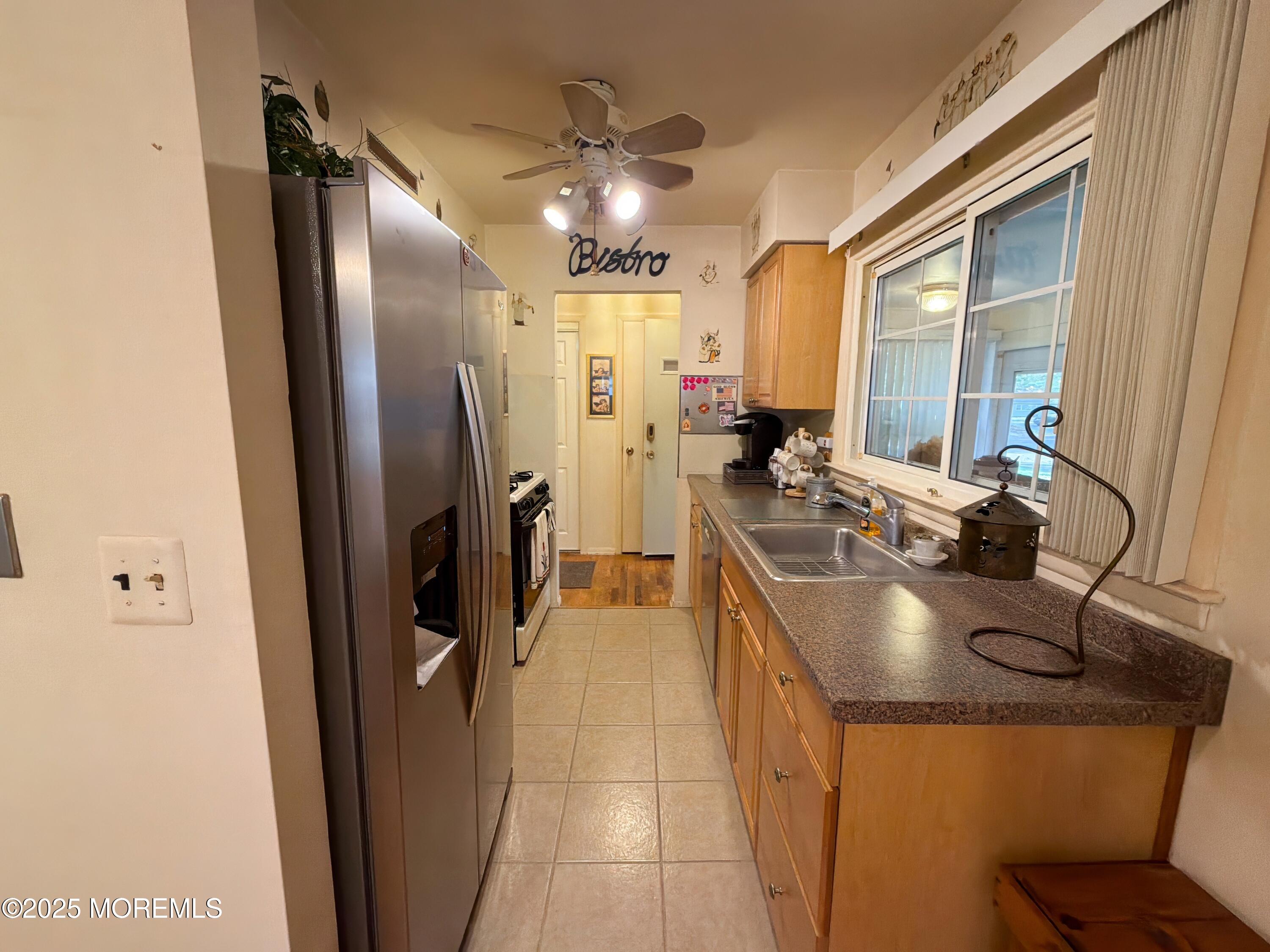 2 Corey Lane, Unit C Jackson, NJ 08527 - Photo 10 of 32 a kitchen with stainless steel appliances granite countertop a refrigerator a stove and a sink