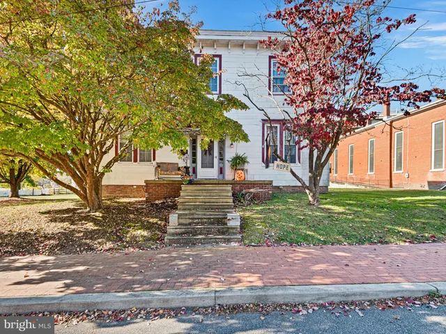 front view of a house with a street