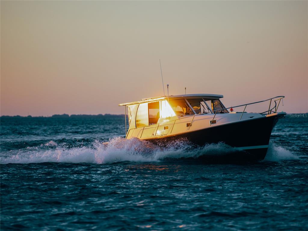 141 North Casey Key Road Nokomis, FL 34275 - Photo 12 of 45 a view of swimming pool with a yard