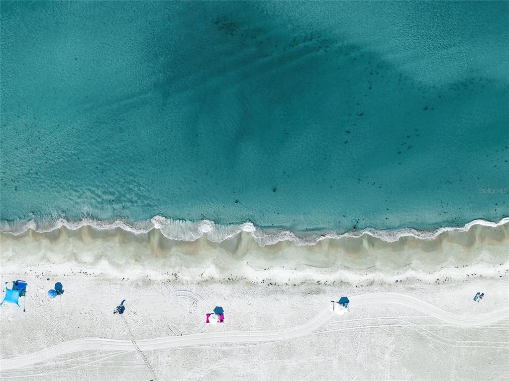 141 North Casey Key Road Nokomis, FL 34275 - Photo 14 of 45 a view of a lake in the middle of a yard