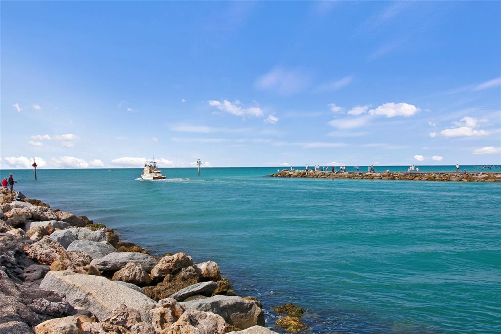 141 North Casey Key Road Nokomis, FL 34275 - Photo 23 of 45 a view of a lake with a big yard